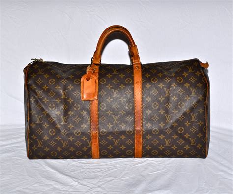 lv duffle bag second hand|louis vuitton duffle bag men's.